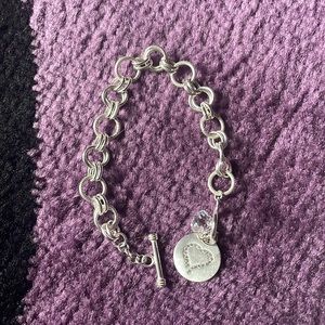 Silver heart charmed bracelet